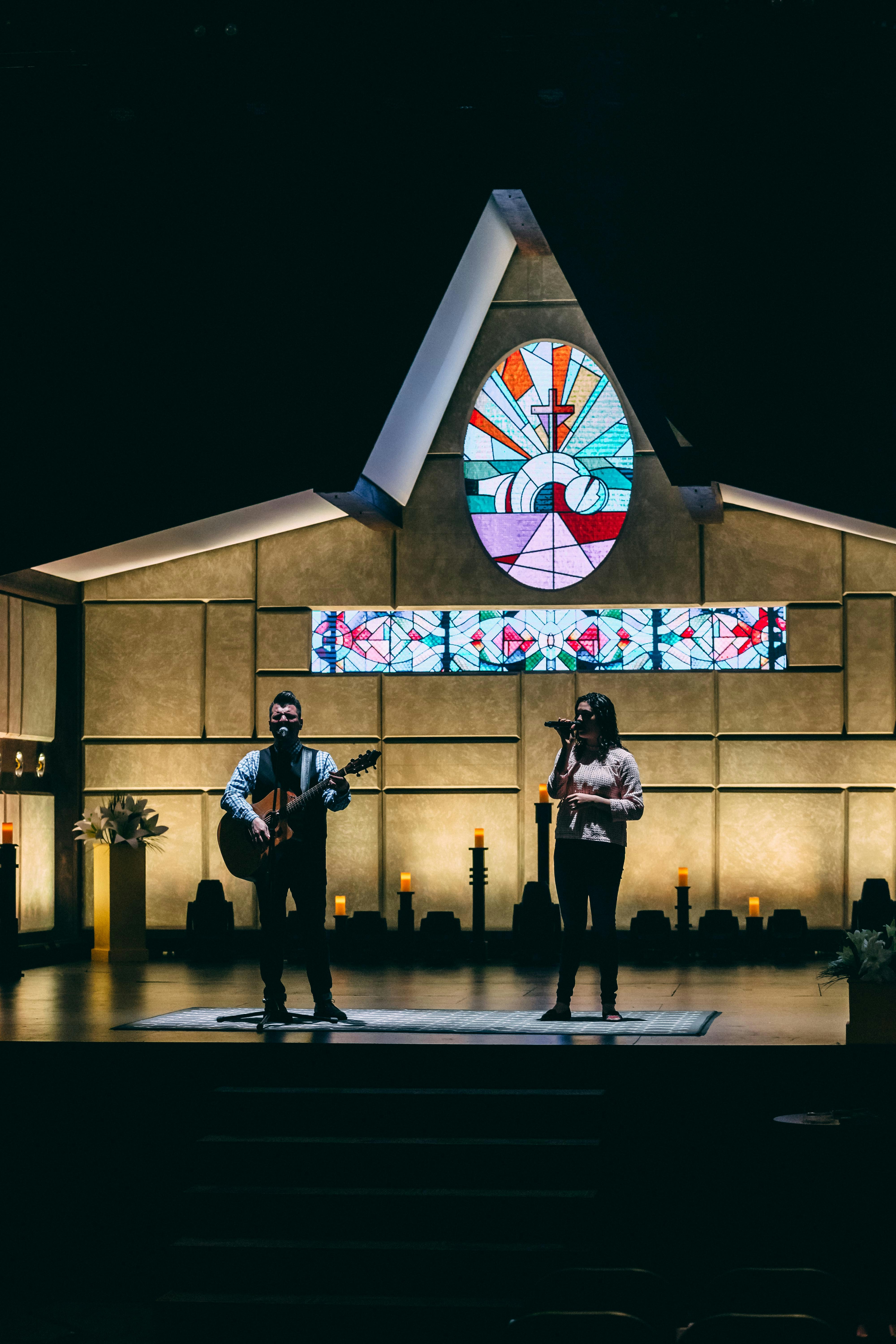 two person performing on stage